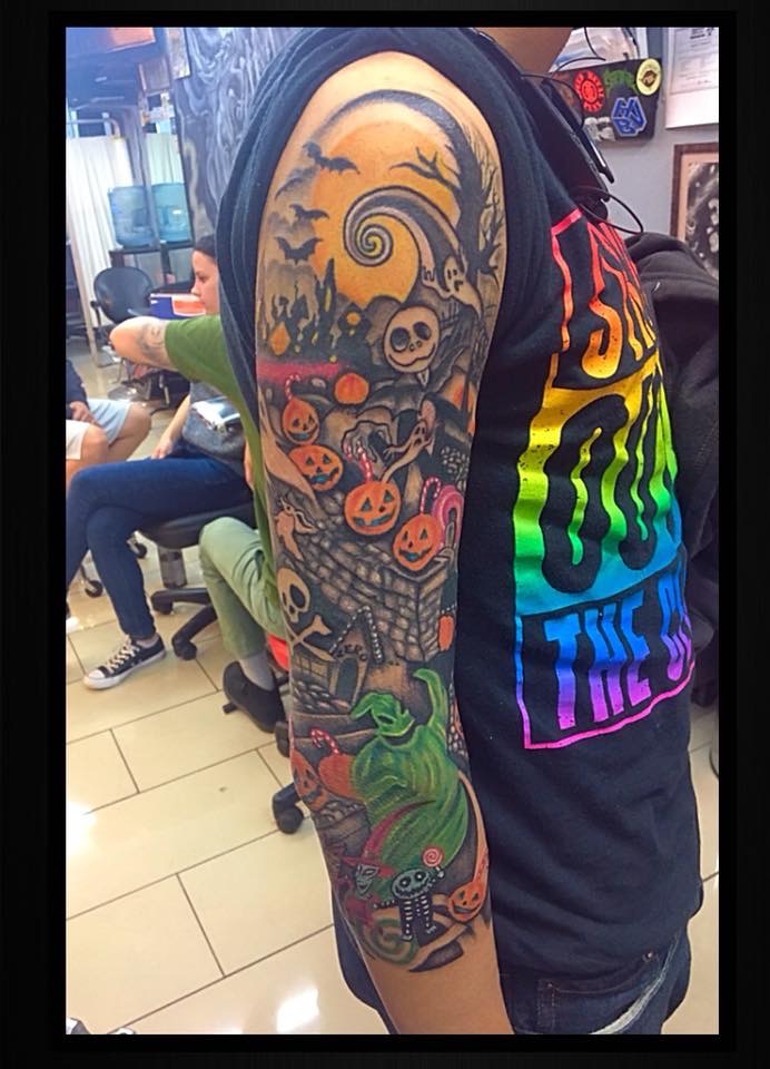 The Nightmare Before Christmas-inspired tattoo on the entire arm of a man